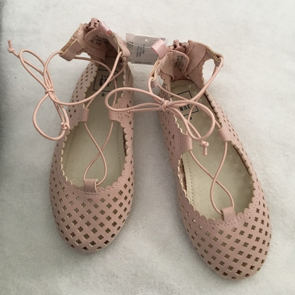 Laser cut pink leather-like lace up ballet flats